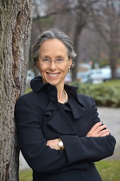 Picture of Dr Dianne Saxe standing beside a tree